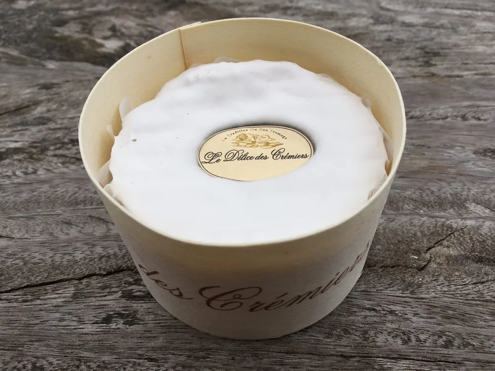 Délice des Crémiers is a soft, white cheese, elegantly packed in a round-shaped carton