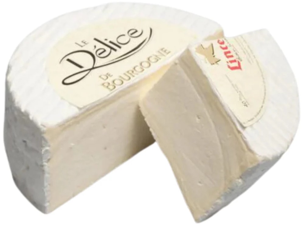 A halved wheel of Délice de Bourgogne cheese, accompanied by a triangular wedge with a label on top, is displayed against a white background