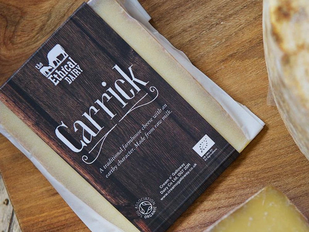 Ethical Dairy's Organic Carrick Cheese on a wooden table