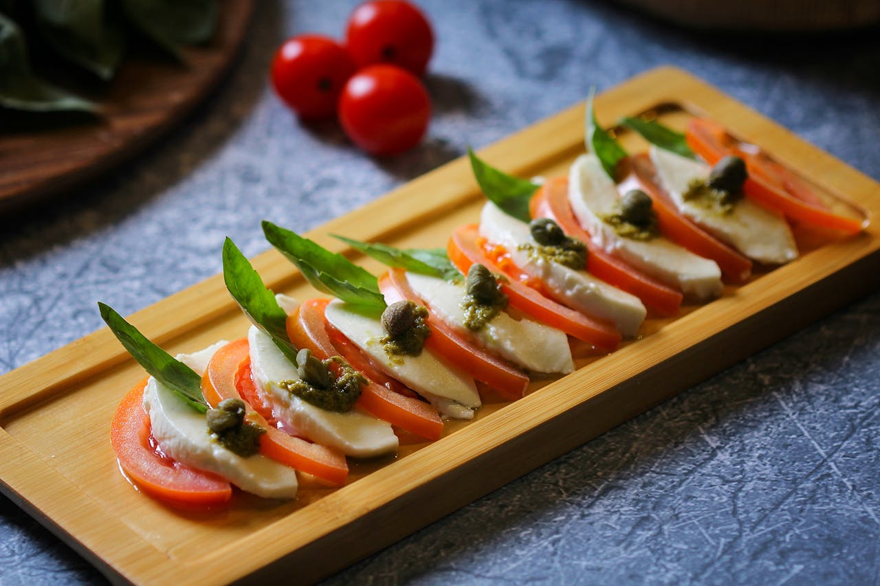 mozzarella cheese with sliced tomatotes